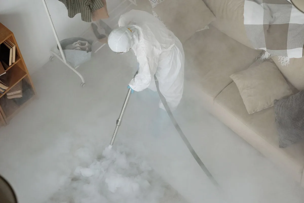 Biohazard cleanup technician in protective equipment, Valhalla, NY